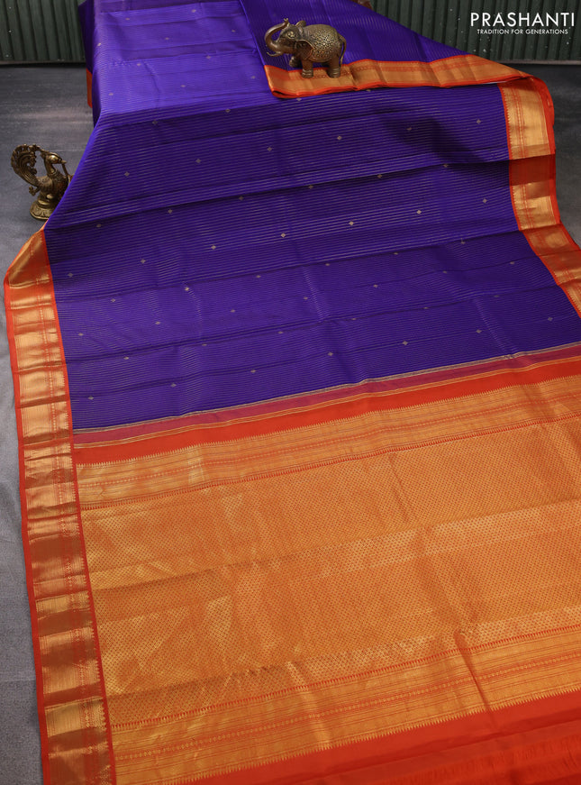 Pure kanchipuram silk saree blue and orange with allover zari weaves and zari woven korvai border