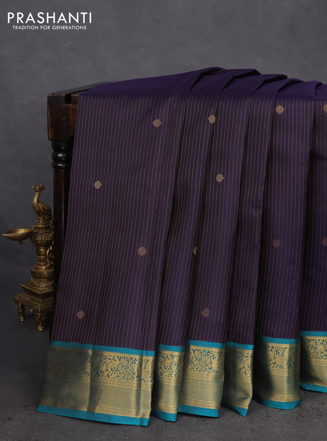 Pure kanchipuram silk saree navy blue and peacock green with allover zari weaves and zari woven korvai border