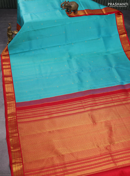 Pure kanchipuram silk saree teal blue and red with allover zari checks & buttas and zari woven korvai border