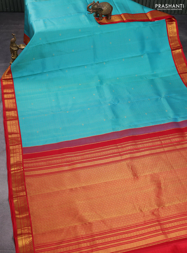 Pure kanchipuram silk saree teal blue and red with allover zari checks & buttas and zari woven korvai border