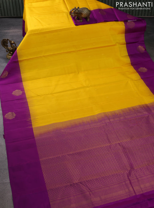 Pure kanchipuram silk saree yellow and deep purple with zari woven buttas and zari woven butta border