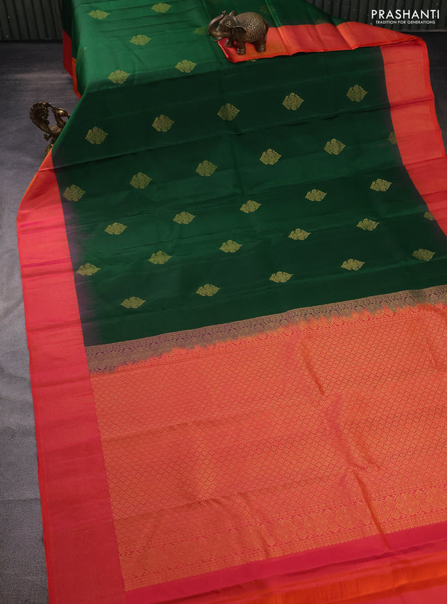 Pure kanchipuram silk saree green and dual shade of pinkish orange with zari woven buttas and zari woven simple border