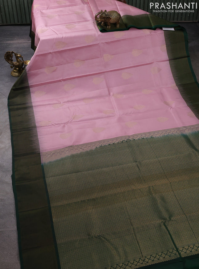 Pure kanchipuram silk saree pastel pink and bottle green with zari woven buttas and zari woven simple border