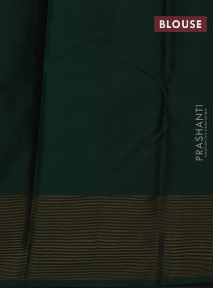 Pure kanchipuram silk saree pastel pink and bottle green with zari woven buttas and zari woven simple border