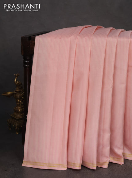 Pure kanchipuram silk saree pastel pink and green with allover stripes pattern in borderless style