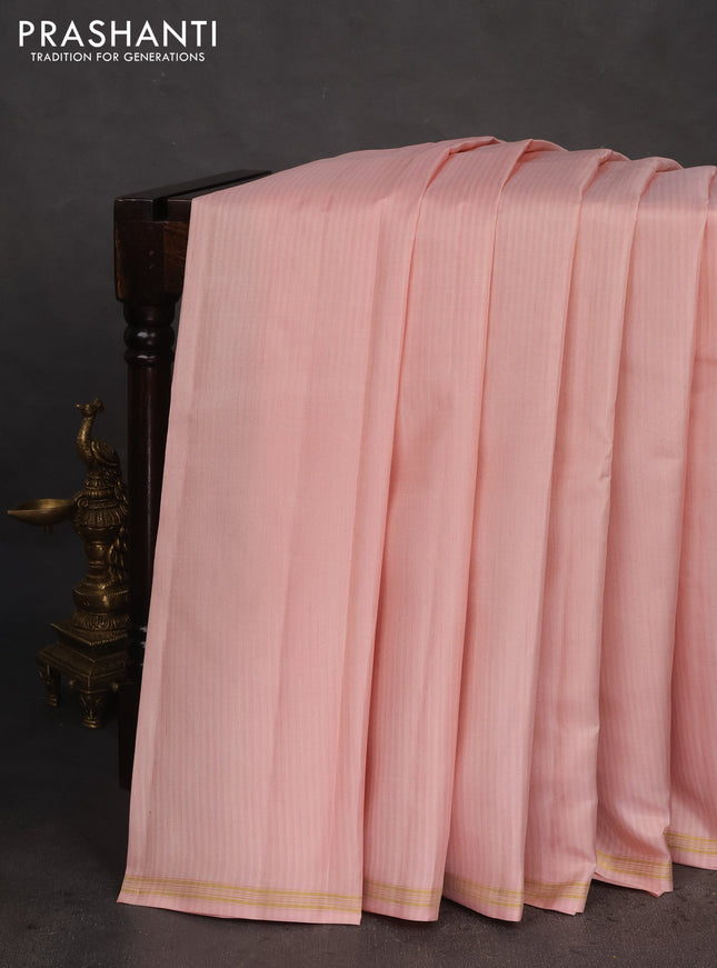 Pure kanchipuram silk saree pastel pink and green with allover stripes pattern in borderless style