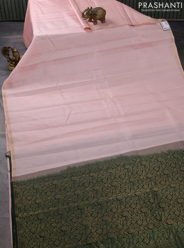 Pure kanchipuram silk saree pastel pink and green with allover stripes pattern in borderless style