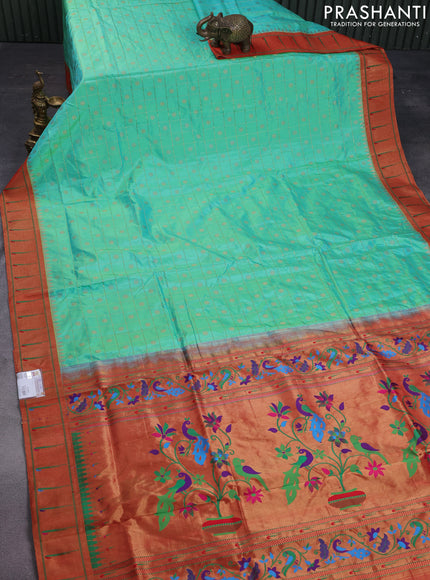 Pure paithani silk saree dual shade of teal blue and red with allover zari checks & buttas and zari woven muniya butta border