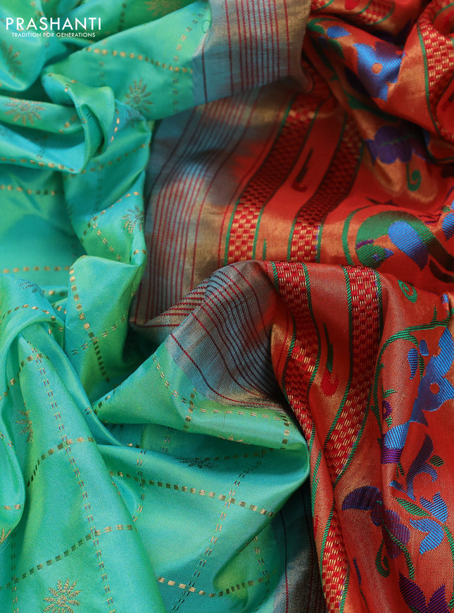 Pure paithani silk saree dual shade of teal blue and red with allover zari checks & buttas and zari woven muniya butta border