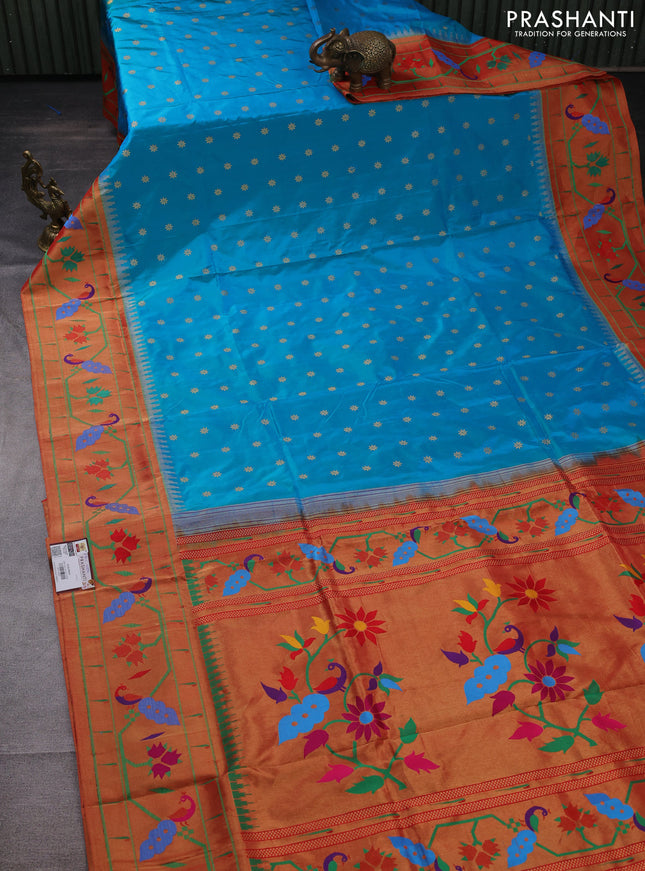Pure paithani silk saree dual shade of teal blue and red with allover zari woven buttas and paithani weaving pallu
