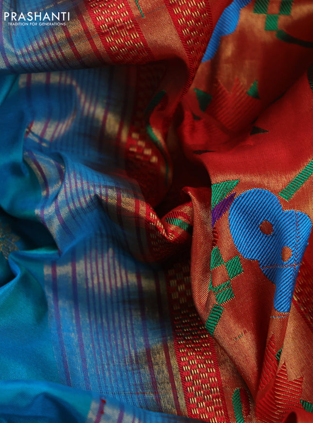 Pure paithani silk saree dual shade of teal blue and red with allover zari woven buttas and paithani weaving pallu