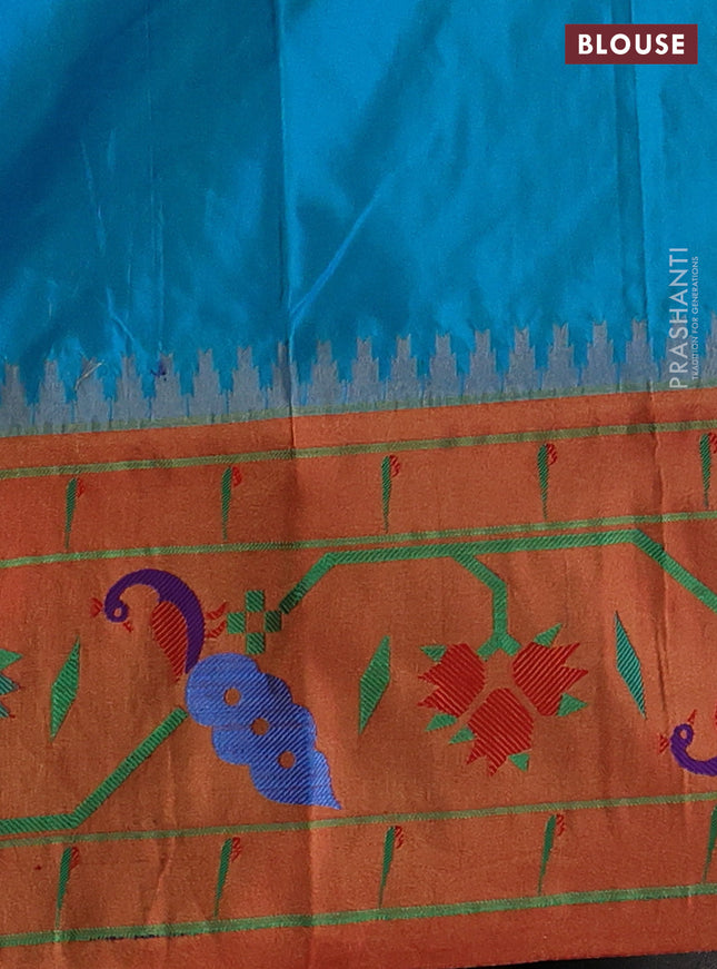 Pure paithani silk saree dual shade of teal blue and red with allover zari woven buttas and paithani weaving pallu