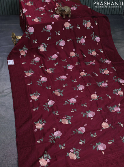 Dola silk saree maroon with allover floral embroidery work and chikankari work border