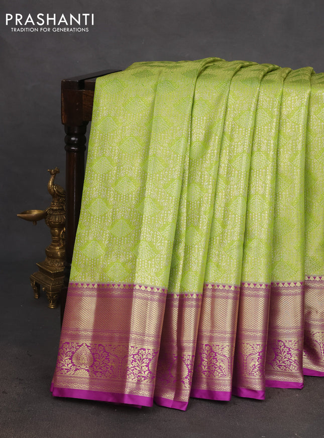 Bangalori tissue silk saree light green and purple with allover silver zari woven brocade weaves and rich zari woven border