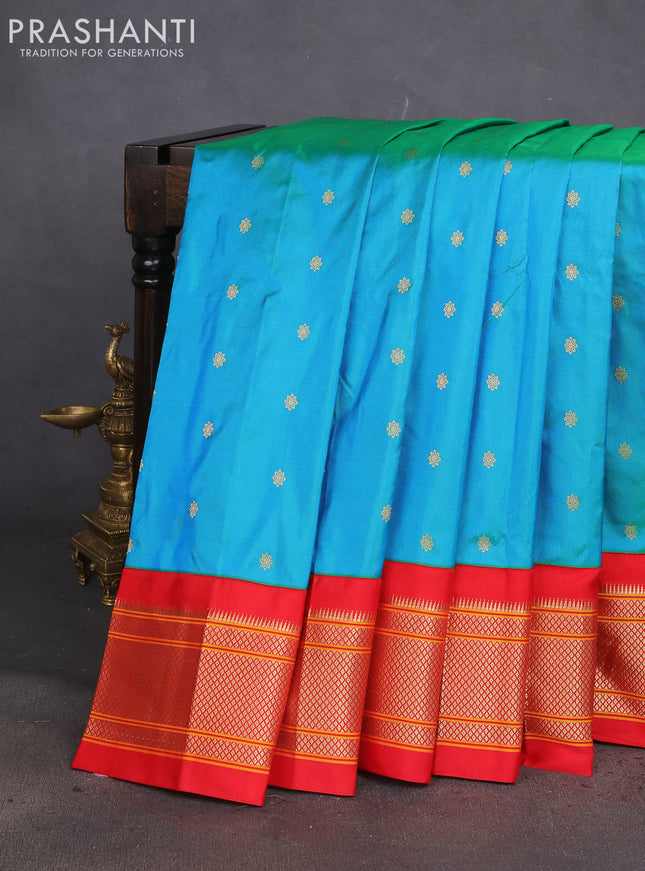Pure paithani silk saree dual shade of teal bluish green and red with allover zari woven buttas and paithani weaving pallu