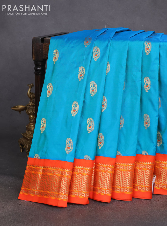 Pure paithani silk saree dual shade of teal bluish green and orange with paisley zari woven buttas and paithani weaving pallu
