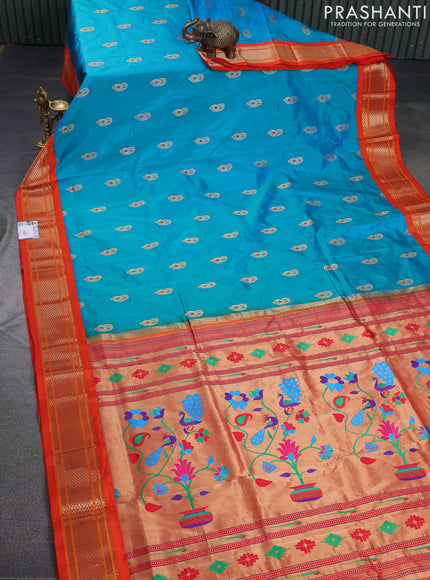 Pure paithani silk saree dual shade of teal bluish green and orange with paisley zari woven buttas and paithani weaving pallu