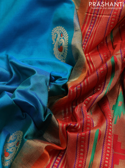 Pure paithani silk saree dual shade of teal bluish green and orange with paisley zari woven buttas and paithani weaving pallu