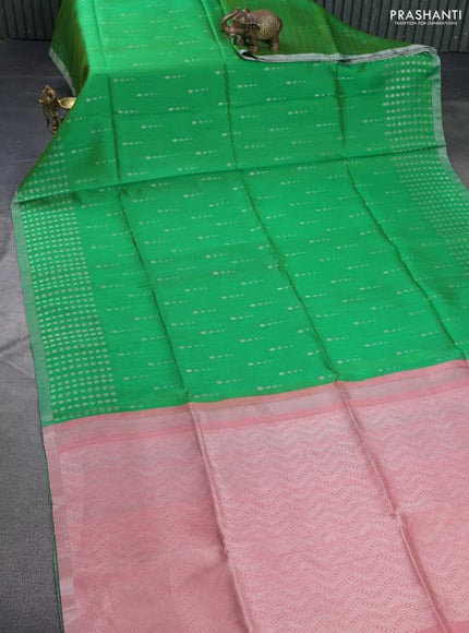 Pure raw silk saree green and pastel peach with allover silver zari woven buttas and silver zari woven border