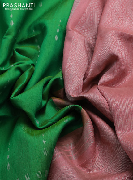 Pure raw silk saree green and pastel peach with allover silver zari woven buttas and silver zari woven border