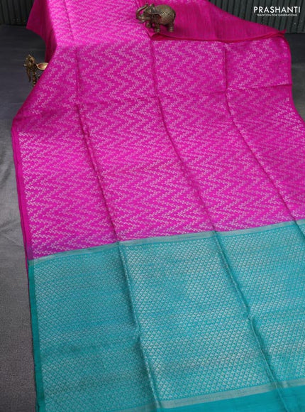 Pure raw silk saree pink and teal green with allover silver zari weaves in borderless style