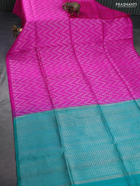 Pure raw silk saree pink and teal green with allover silver zari weaves in borderless style