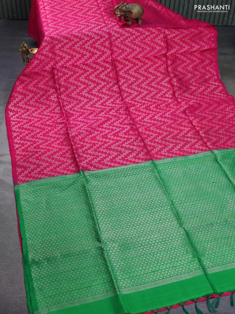 Pure raw silk saree pink and green with allover silver zari weaves in borderless style