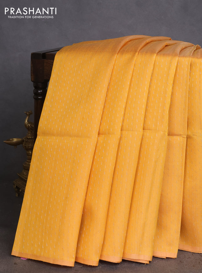 Pure raw silk saree yellow and pink with allover silver zari weaves in borderless style