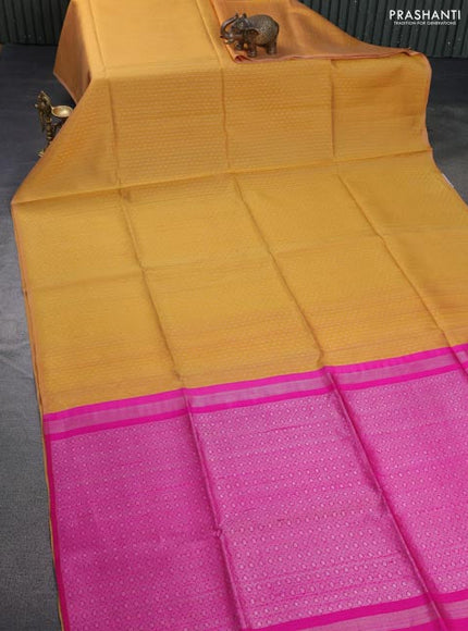 Pure raw silk saree yellow and pink with allover silver zari weaves in borderless style