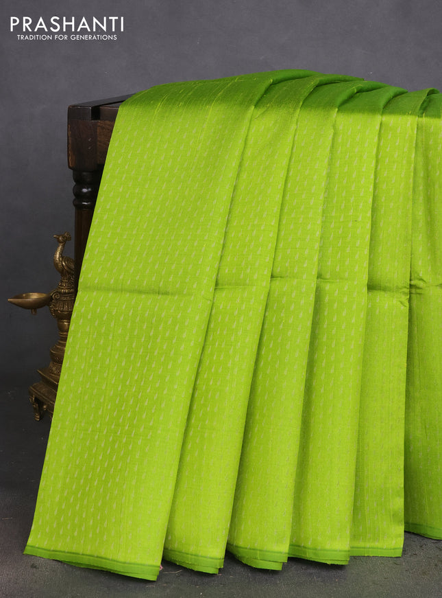 Pure raw silk saree light green and pink with allover silver zari weaves in borderless style