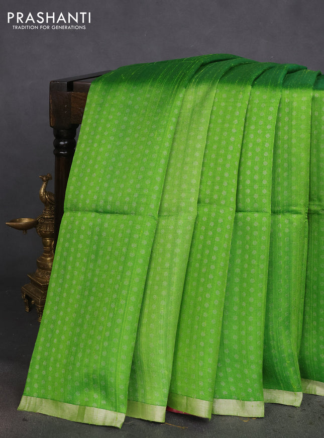 Pure raw silk saree light green and pink with allover silver zari woven 1000 buttas and silver zari woven border