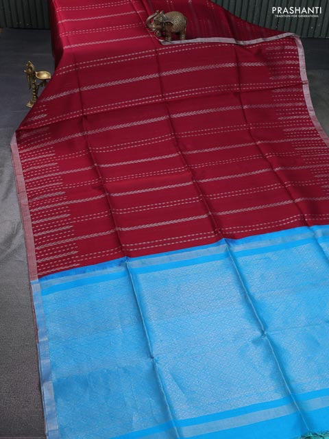 Pure raw silk saree maroon and cs blue with allover silver zari weaves and silver zari woven border