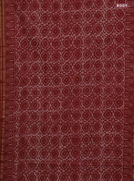 Chanderi bagru saree rustic orange and off white with allover dabu prints and small zari woven border