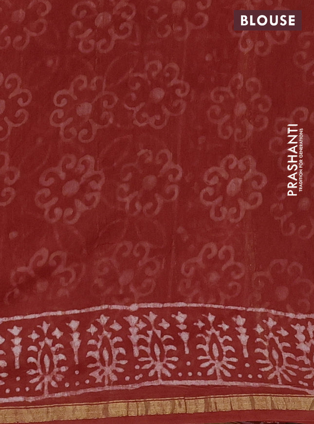 Chanderi bagru saree rustic orange and off white with allover dabu prints and small zari woven border