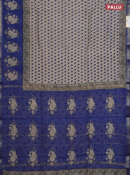 Chanderi bagru saree beige and blue with allover floral butta prints and maheswari border