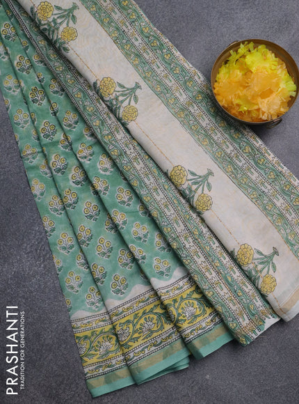 Chanderi bagru saree pastel green with allover floral butta prints and small zari woven border