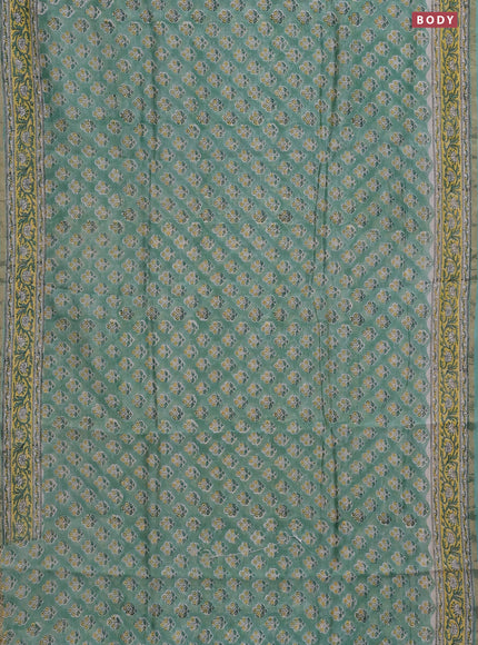 Chanderi bagru saree pastel green with allover floral butta prints and small zari woven border