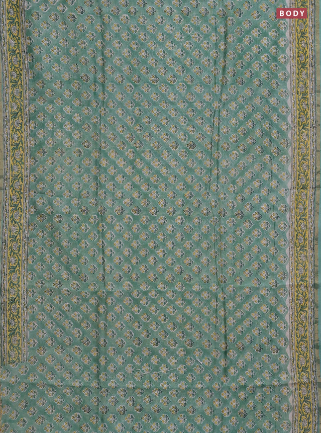 Chanderi bagru saree pastel green with allover floral butta prints and small zari woven border