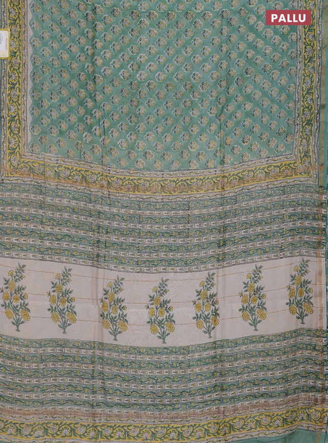 Chanderi bagru saree pastel green with allover floral butta prints and small zari woven border