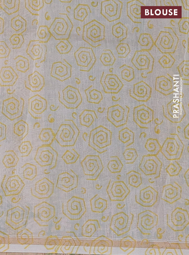 Chanderi bagru saree pastel green with allover floral butta prints and small zari woven border