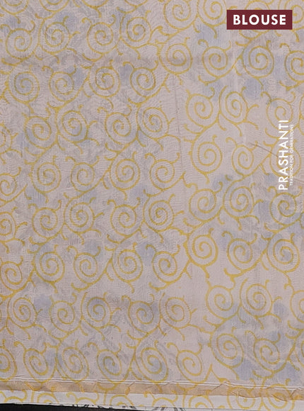 Chanderi bagru saree pale yellow and blue with allover floral butta prints and small zari woven border