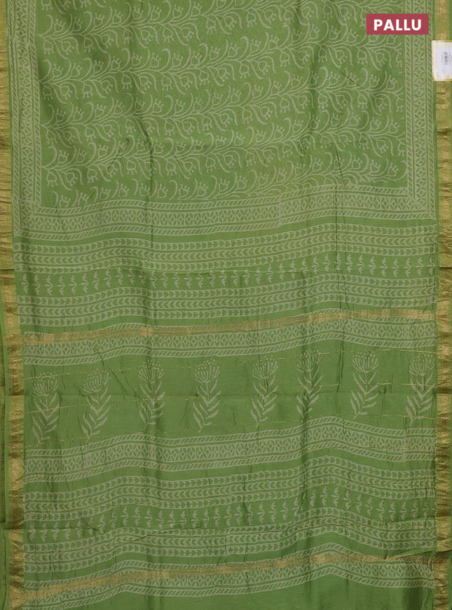 Chanderi bagru saree light green with allover prints and maheswari border