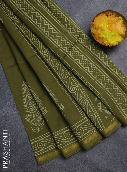 Chanderi bagru saree sap green with butta prints and small zari woven border
