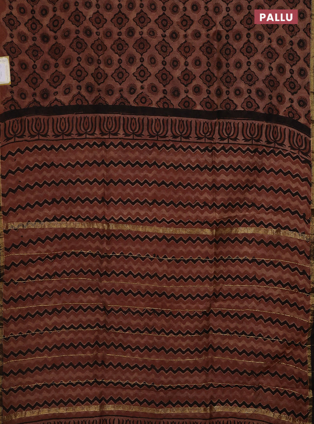 Chanderi bagru saree pastel brown and black with allover ajrakh prints and small zari woven border