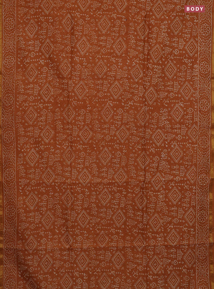 Chanderi bagru saree dark mustard with allover warli prints and small zari woven border