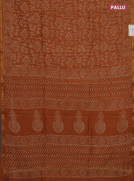 Chanderi bagru saree dark mustard with allover warli prints and small zari woven border