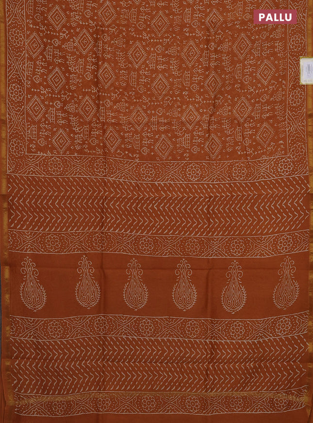 Chanderi bagru saree dark mustard with allover warli prints and small zari woven border