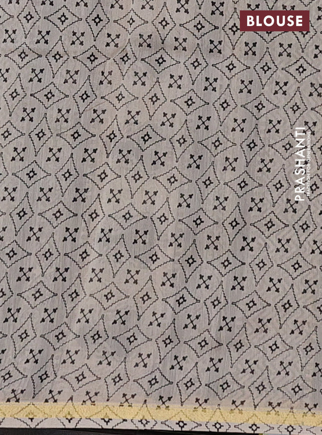 Chanderi bagru saree blue and black with allover floral prints and small zari woven border