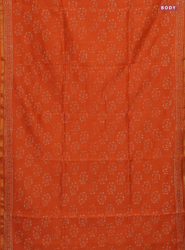 Chanderi bagru saree orange with allover dfloral butta prints and small zari woven border