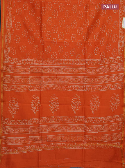 Chanderi bagru saree orange with allover dfloral butta prints and small zari woven border